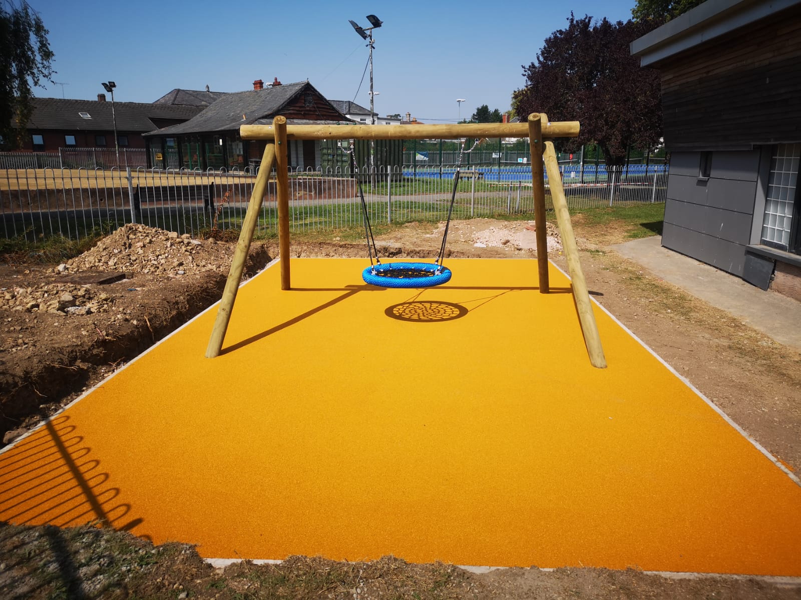 IMG-20250813-WA0003 Basket Swing - Timber - Wetpour Surfacing